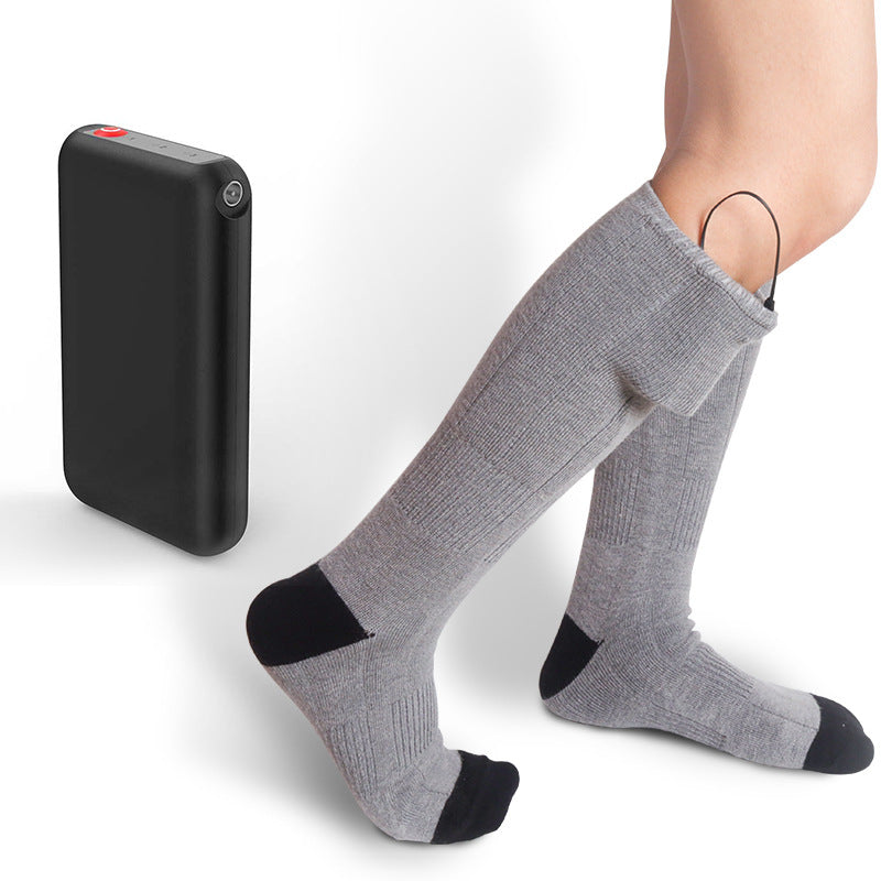 Calcetines calefactables recargables grises con batería USB